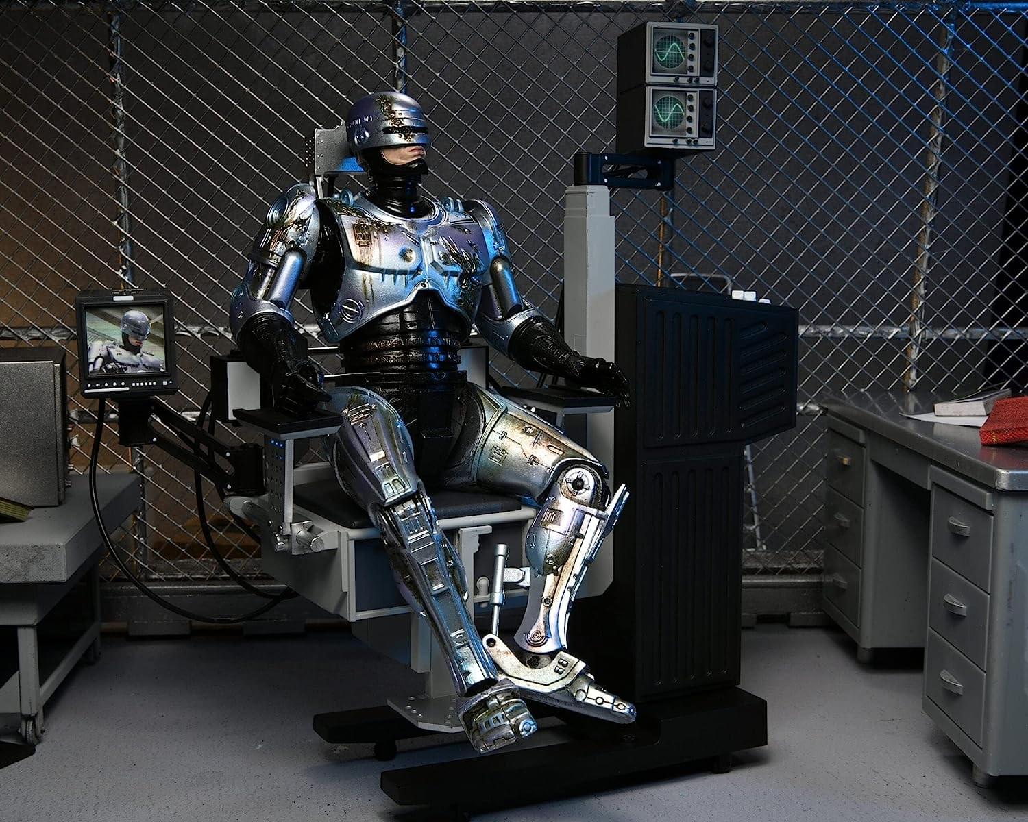 RoboCop Ultimate 7 Inch Action Figure | Battle Damaged RoboCop with Chair - Image 2